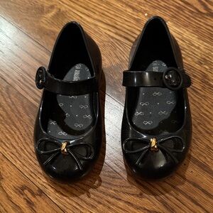 Melissa Black Patent Mary Jane Dress Shoes with Gold Accent